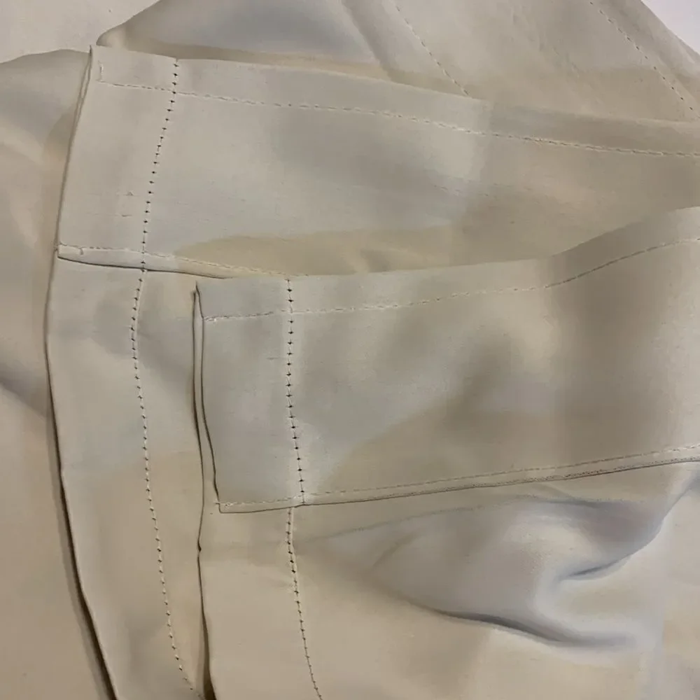 One pair (two panels) cream valance with blue/purple detail